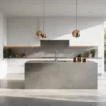 Photorealistic modern luxury kitchen featuring floor-to-ceiling white matte cabinets, dove grey quartz waterfall island, stainless steel appliances, marble backsplash, and ample natural light from floor-to-ceiling windows, accented with copper cookware and fresh herbs.